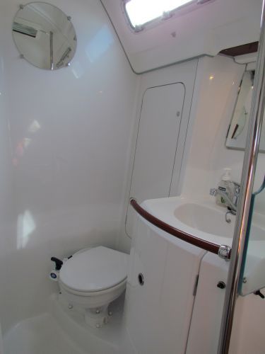 Pearl's Head: The toilet, sink, and vanity
